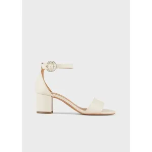 Leather sandals with heel and logoed medal